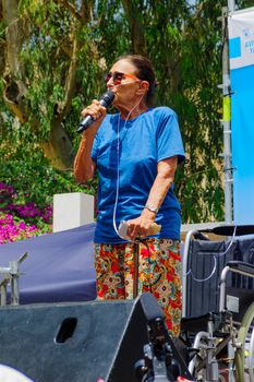 TEL-AVIV, ISRAEL - JUNE 03, 2016: Yael Dayan speaks to the crowd after being honored, as part of the Pride Parade in Tel-Aviv, Israel. Its part of an annual event of the LGBT community