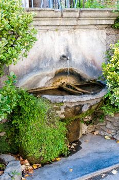 A little fountain in a Provencal village in the South of France