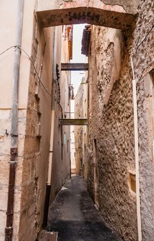 View of a little narrow street in the town of Brignoles in Provence, south of France