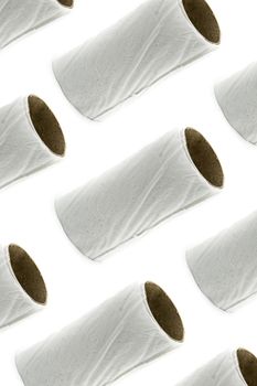 Empty toilet paper rolls pattern isolated on white background