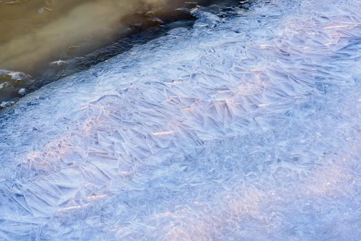 Frozen ice texture on the Dnieper river in Kiev, Ukraine, during winter