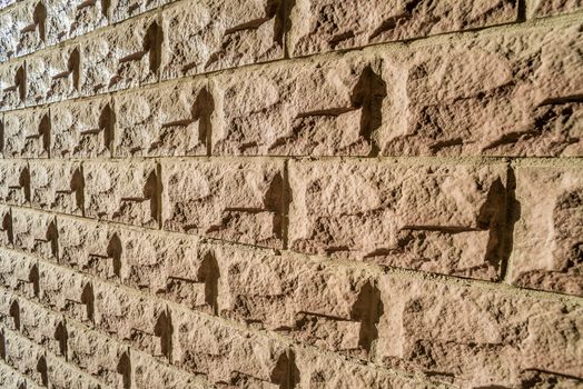 A modern stone wall with perspective effect and vanishing lines