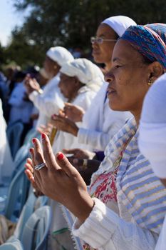 JERUSALEM - NOV 20, 2014: Ethiopian Jewish women pray at the Sigd, in Jerusalem, Israel. The Sigd is an annual holiday of the Ethiopian Jews