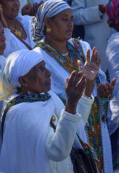 JERUSALEM - NOV 20, 2014: Ethiopian Jewish women pray at the Sigd, in Jerusalem, Israel. The Sigd is an annual holiday of the Ethiopian Jews