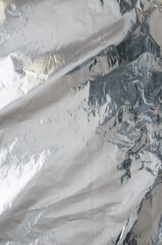Crumpled aluminum metal foil with ambient reflection