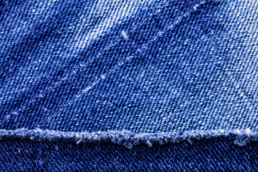 Macro of a blue jeans texture, denim fabric closeup