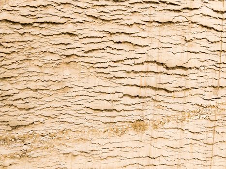 Compressed sand texture on a construction site. Useful as background of bump texture for 3d rendering. Copy space