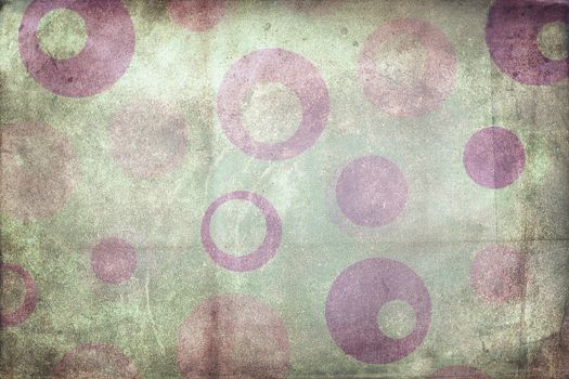 Texture background made of  purple dots, or circles, on green