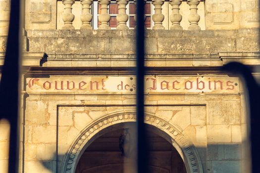 SAINT EMILION, FRANCE - May 25, 2017 : facade of the castle of the convent of the Jacobins dating from the 16th sciecle, a great brand of fine wines on a spring day