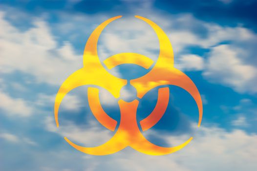 Biohazard symbol in the sky with clouds