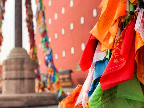 Buddhist color prayer flags at The Putuo Zongcheng Buddhist Temple, one of the Eight Outer Temples of Chengde, built in 1767 and modeled after the Potala Palace of Tibet. Chengde, China