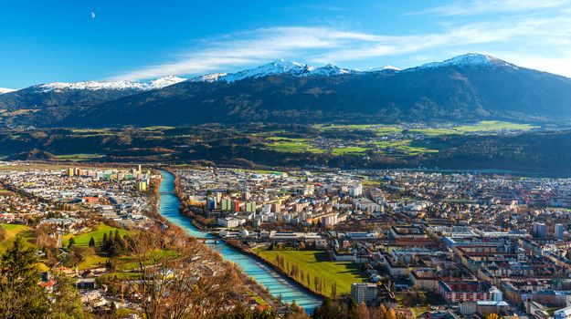 Innsbruck, Austria: wide angle aerial panorama of the most popular Austrian city and capital of western state of Tyrol