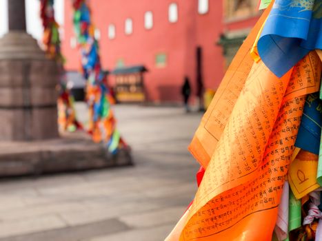 Buddhist color prayer flags at The Putuo Zongcheng Buddhist Temple, one of the Eight Outer Temples of Chengde, built in 1767 and modeled after the Potala Palace of Tibet. Chengde, China