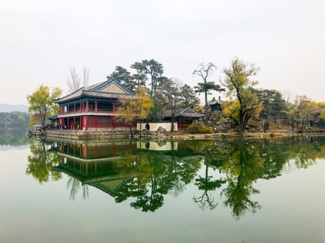 Little pavilions next the lake inside the Imperial Summer Palace of The Mountain Resort in Chengde. China. Chinese ancient building with lake. UNESCO World Heritage.