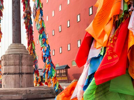 Buddhist color prayer flags at The Putuo Zongcheng Buddhist Temple, one of the Eight Outer Temples of Chengde, built in 1767 and modeled after the Potala Palace of Tibet. Chengde, China