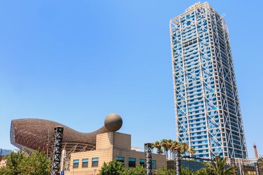 BARCELONA, SPAIN - June 21, 2017 : architectural detail of the Hotel Arts tower during the summer, a skyscraper designed by the American architect Bruce Graham and built for the 1992 Summer Olympics