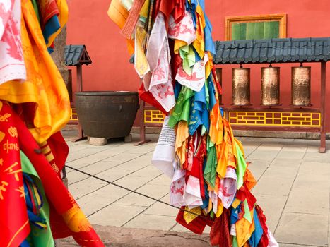 Buddhist color prayer flags at The Putuo Zongcheng Buddhist Temple, one of the Eight Outer Temples of Chengde, built in 1767 and modeled after the Potala Palace of Tibet. Chengde, China