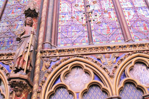 The Sainte Chapelle (Holy Chapel) in Paris, France. The Sainte Chapelle is a royal medieval Gothic chapel in Paris and one of the most famous monuments of the city