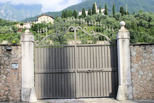 ancient stone gate on the lake in Italy