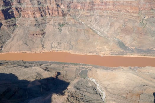 Picturesque landscape view of Grand Canyon National Park with Colorado river during sunny day. Arizona, USA. Famous travel destination.