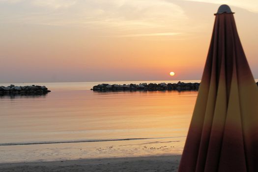 sunrise on the beach of the Adriatic sea in Italy