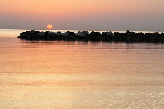 sunrise on the beach of the Adriatic sea in Italy