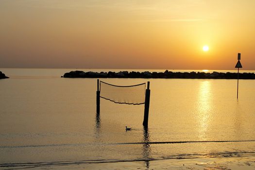 sunrise on the beach of the Adriatic sea in Italy