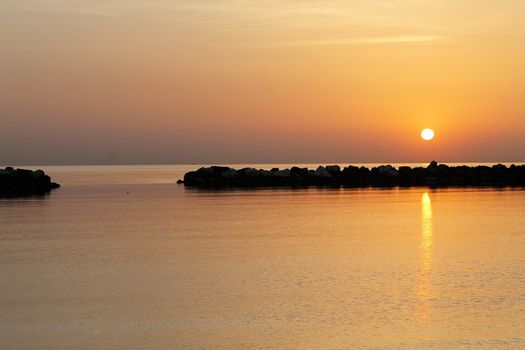 sunrise on the beach of the Adriatic sea in Italy