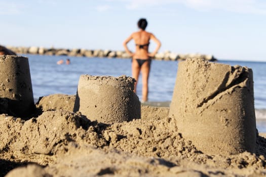 sand castle built on the beach in the sand