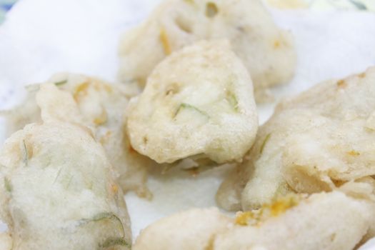 zucchini flowers in batter with mozzarella and anchovies