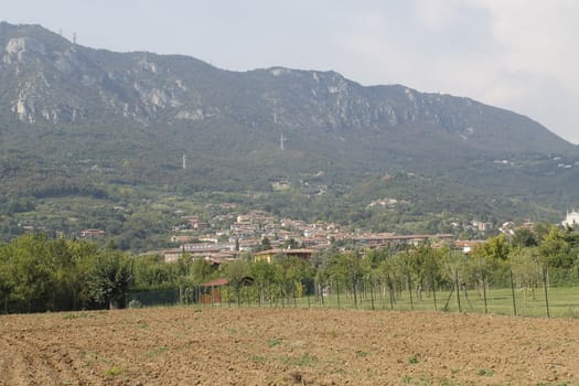 Agricultural landscape with town of Botticino in Italy