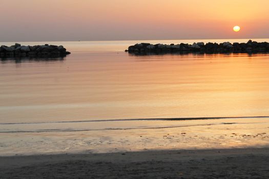 sunrise on the beach of the Adriatic sea in Italy