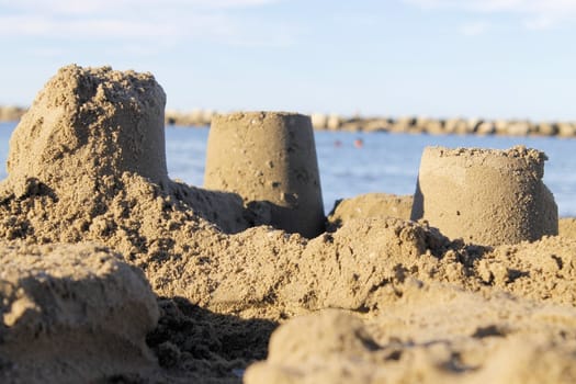 sand castle built on the beach in the sand