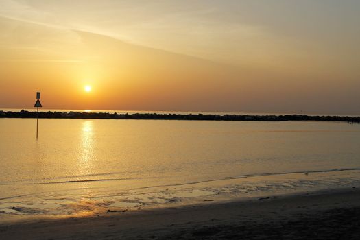 sunrise on the beach of the Adriatic sea in Italy