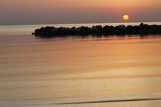 sunrise on the beach of the Adriatic sea in Italy