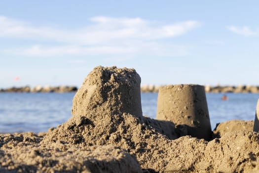 sand castle built on the beach in the sand