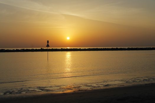 sunrise on the beach of the Adriatic sea in Italy