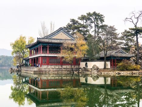 Little pavilions next the lake inside the Imperial Summer Palace of The Mountain Resort in Chengde. China. Chinese ancient building with lake. UNESCO World Heritage.