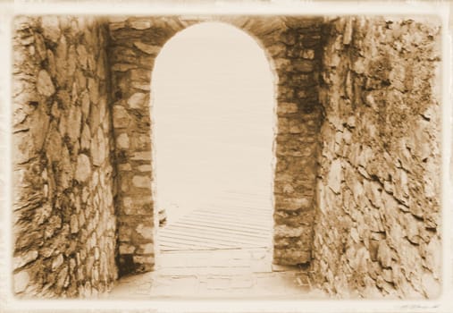 ancient stone gate on the lake in Italy