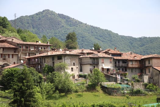 view of the small village of " Costa di Gargnano " in the mountains of Garda lake in northern Italy