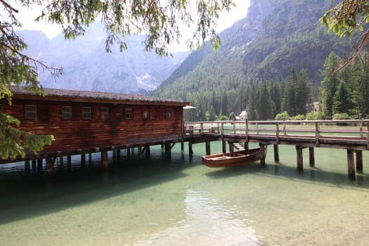 Wooden hut on lake Braies, Dolomites, Italy