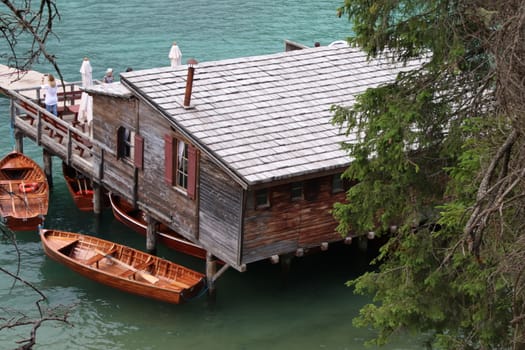 Wooden hut on lake Braies, Dolomites, Italy