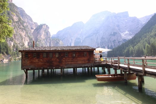 Wooden hut on lake Braies, Dolomites, Italy