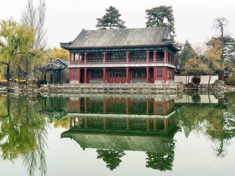 Little pavilions next the lake inside the Imperial Summer Palace of The Mountain Resort in Chengde. China. Chinese ancient building with lake. UNESCO World Heritage.