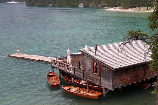 Wooden hut on lake Braies, Dolomites, Italy