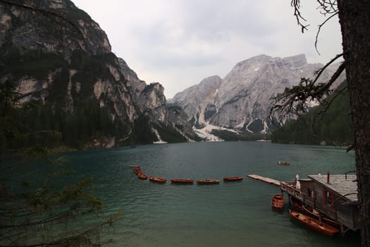 Braies lake at summer. Largest natural lake in Dolomites, South Tyrol, Italy, Europe. Beauty of nature background.