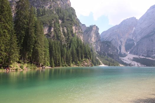 Braies lake turquoise water and Dolomites Alps view, South Tyrol region of Italy