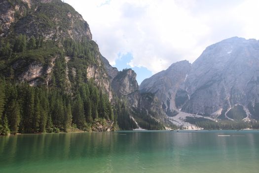 Braies lake turquoise water and Dolomites Alps view, South Tyrol region of Italy