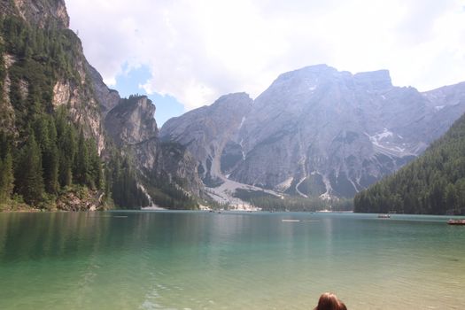 Braies lake turquoise water and Dolomites Alps view, South Tyrol region of Italy