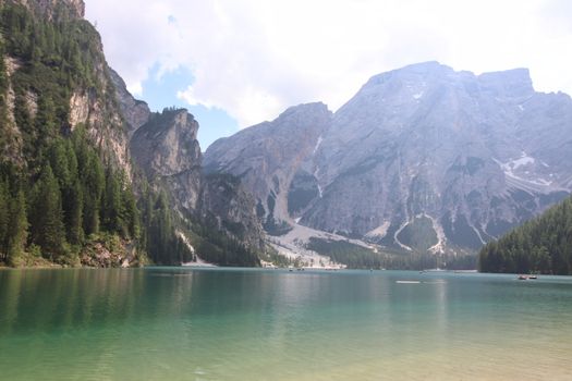 Braies lake turquoise water and Dolomites Alps view, South Tyrol region of Italy